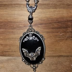 Costume jewelry necklace with bat pendant, may contain nickel